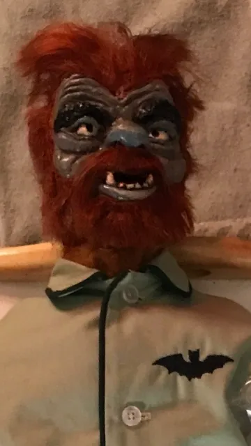 A close up of a mask with a beard