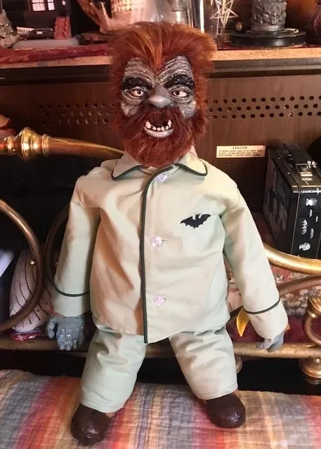 A doll of the werewolf is wearing pajamas.