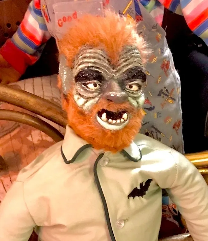 A man with orange hair and red face.